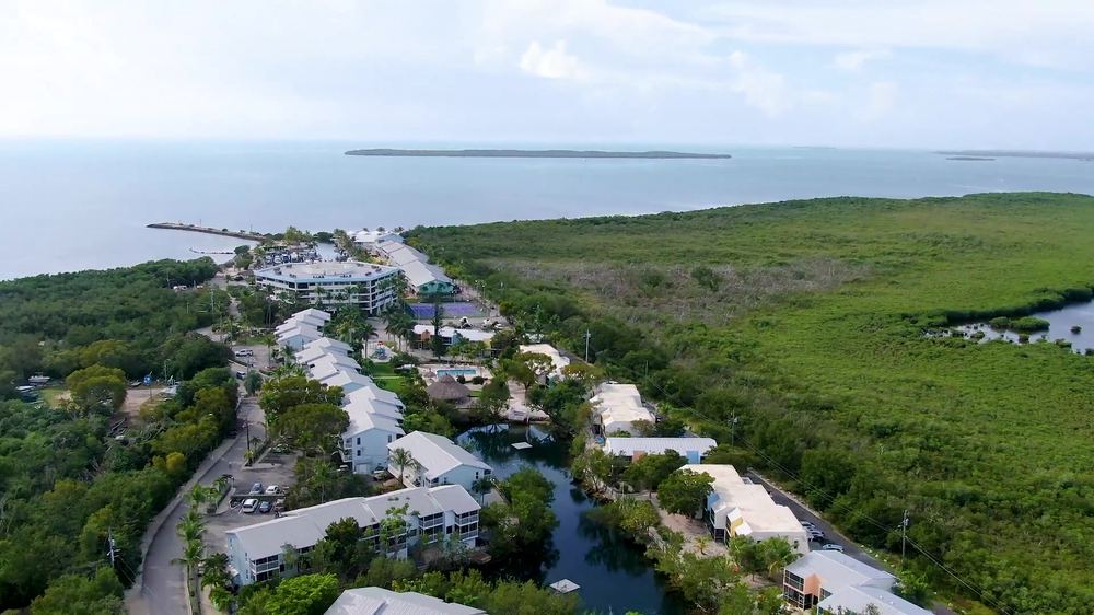 Aerial view of Kawama Yacht Club, the mangroves and the ocean